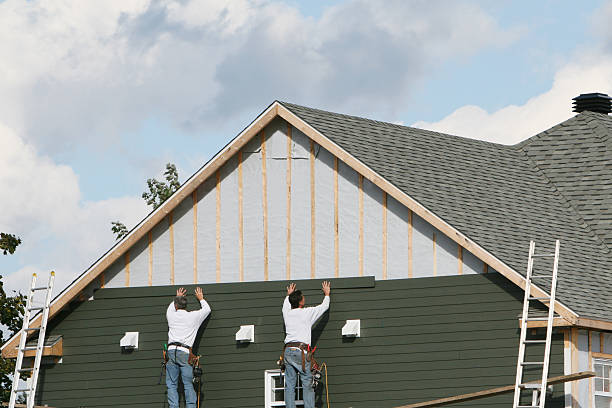 Professional Siding technician working in Medina, NY